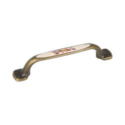 Tirador de mueble tipo asa, modelo 834, de zamak y abs con acabado en cuero viejo e ilustrado con flor, 96 mm, blíster 4 uds.
